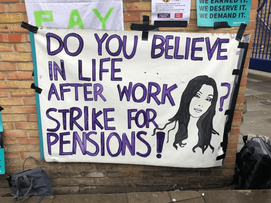 A sign on the side of a building

Description automatically generated